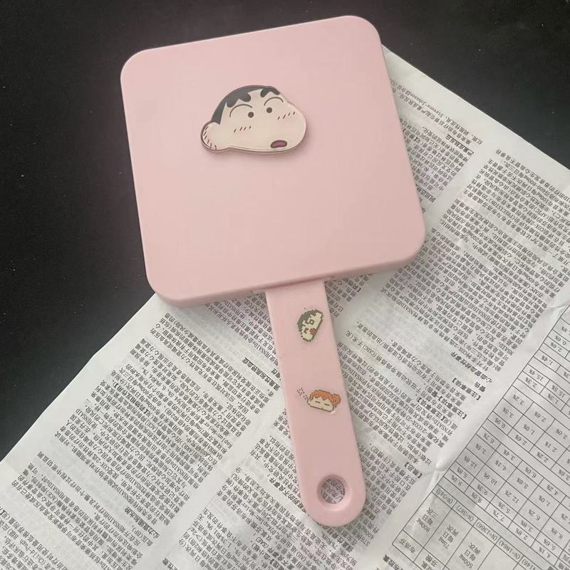 新商品のクレヨンの小さい新しいハンドルの鏡は櫛を持って携帯して化粧の鏡の少女の心の鏡を持って一体の小さい鏡の女性を櫛にします。|undefined