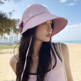 条纹蝴蝶结渔夫帽女夏季2025新款户外出游遮阳盆帽显脸小防晒帽子