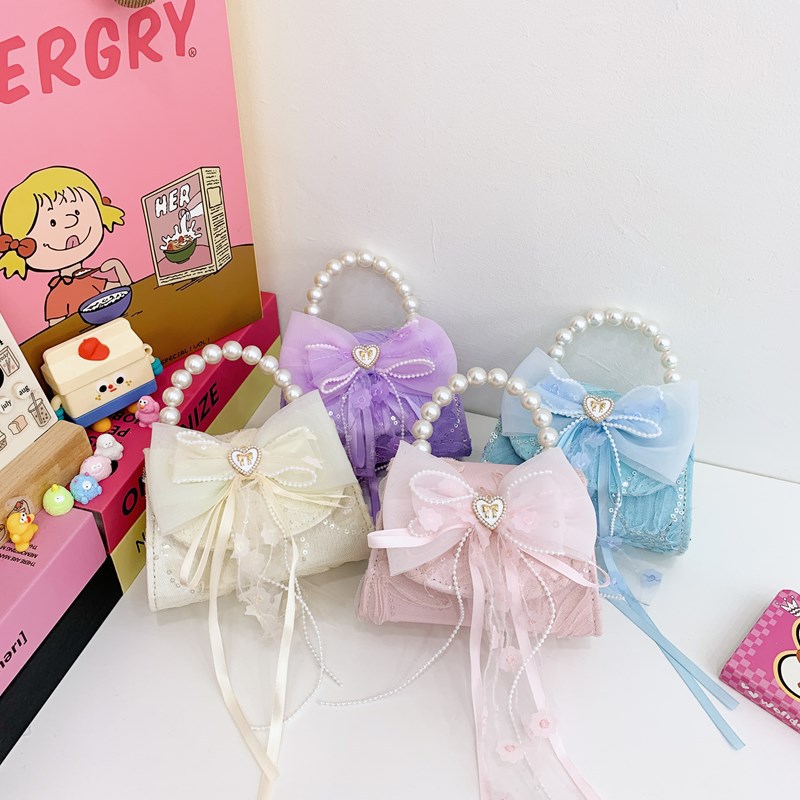 Lindo bolso de cadena de niña de estilo princesa, bolso de bebé de amor con lazo, bolso de niño de encaje con fragancia pequeña