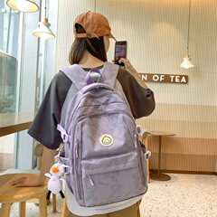 リュックサックの男性の潮のクールなプリントとキャンプの新型の手提げのリュックサックの大容量の韓国版の日本の小中学生のカバンの女性