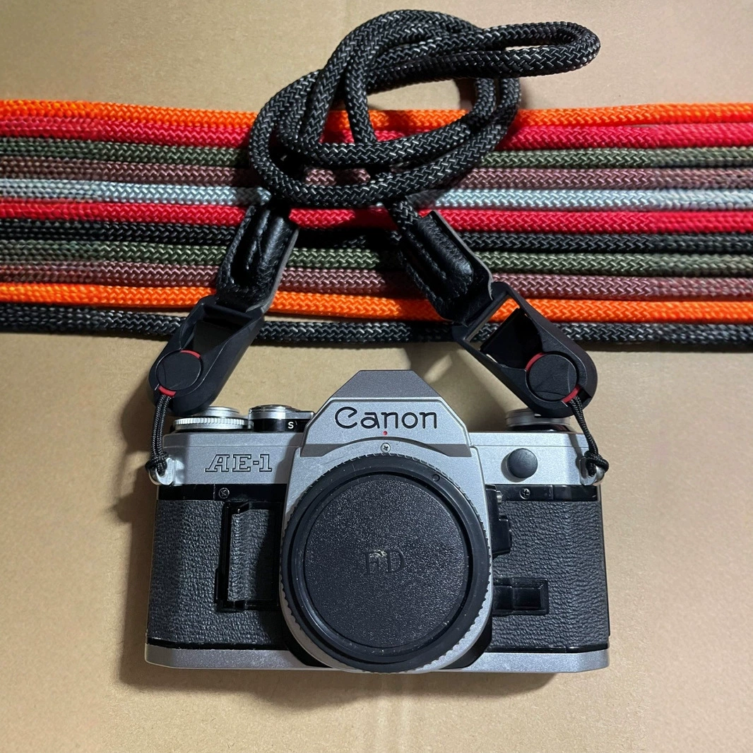 Camera, suspenders, fast multicoloured straps, direct factory sales