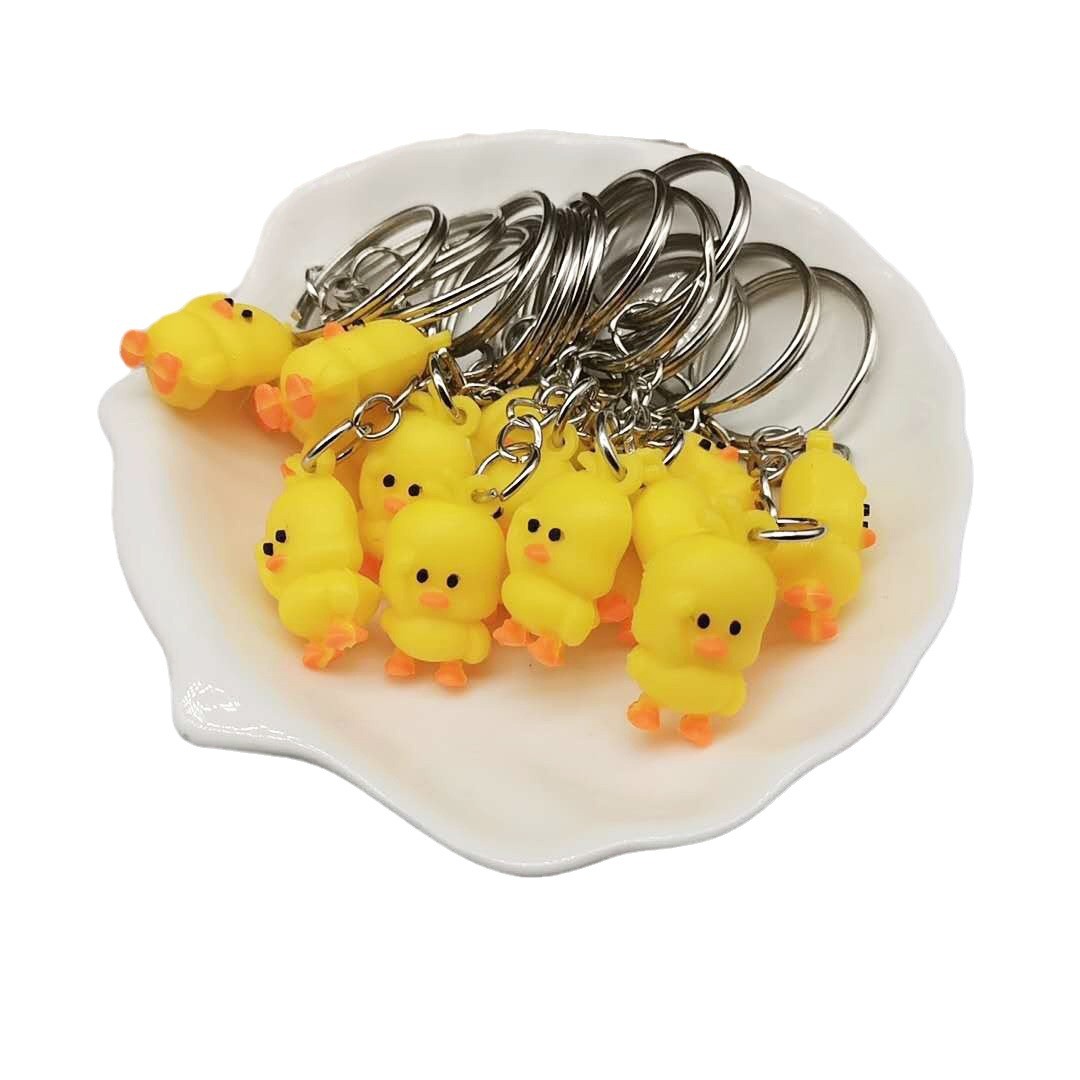 2.5cm mini pato amarillo llavero PVC pegamento suave pato amarillo llavero colgante regalo juguete al por mayor