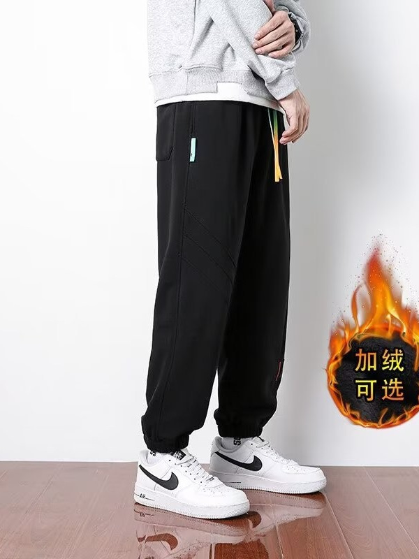 Primavera y otoño 2024 nuevos pantalones casuales para hombres, pantalones deportivos sueltos de la marca de moda juvenil, pantalones deportivos sueltos de color sólido
