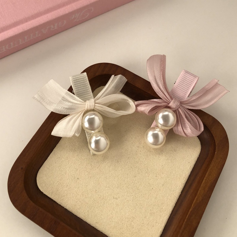 Fuchsia hairgrip with bow