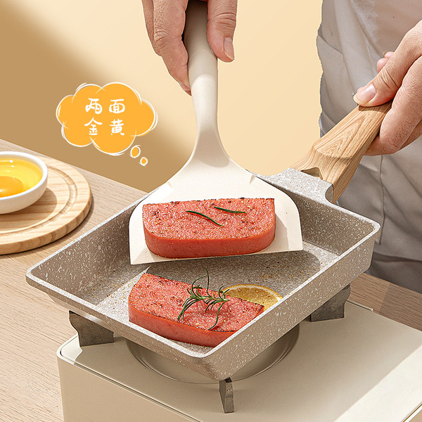 Silicone spatula withstands high temperatures and does not damage…
