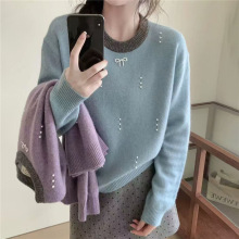 韩版设计感蝴蝶结钉珠毛衣女2025冬季新款时尚洋气宽松拼色针织衫