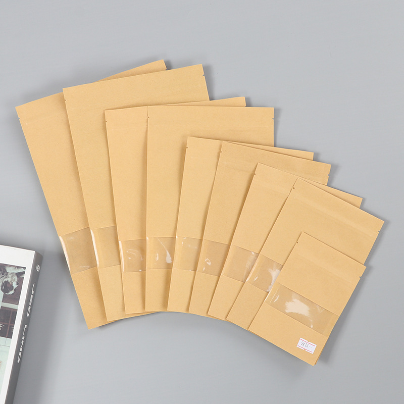 Spot bolsa de papel kraft con ventana transparente bolsa de embalaje de alimentos autosellada autoportante bolsa de té sellada de ocho lados fácil de rasgar