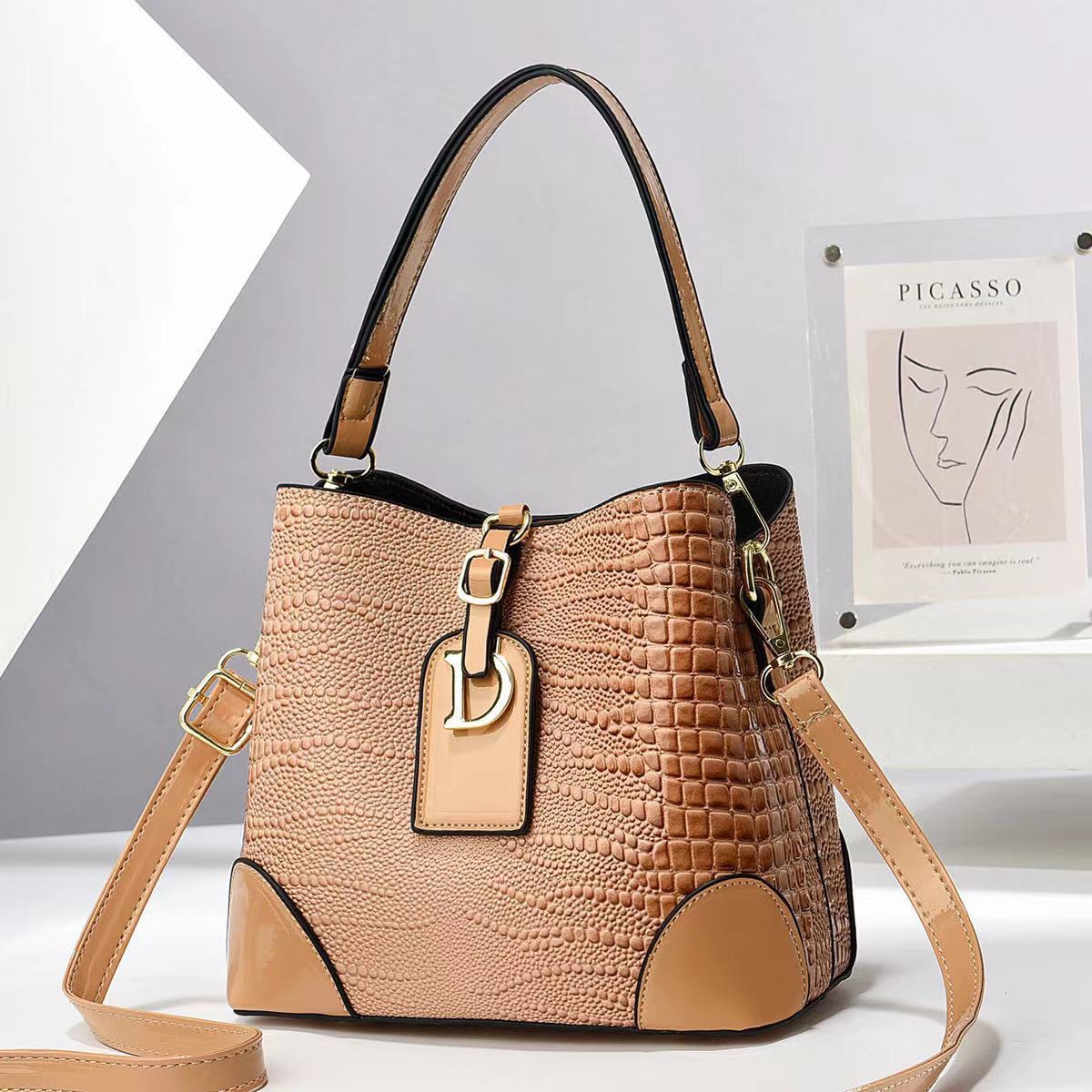 Bolso de cubo de cuero brillante Taizhou bolso de mujer bag con patrón de cocodrilo bolso de hombro de comercio exterior bolso de mensajero de textura bags