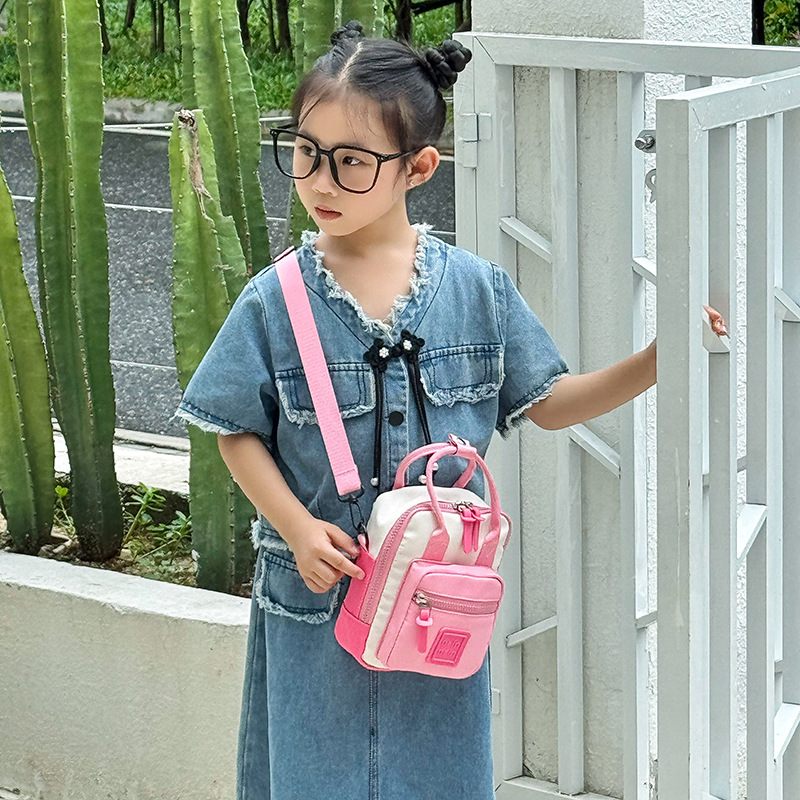 Nuevo mini mochila infantil multifuncional al aire libre bebé mochila de moda de color contraste bolso de hombro para hombres y mujeres
