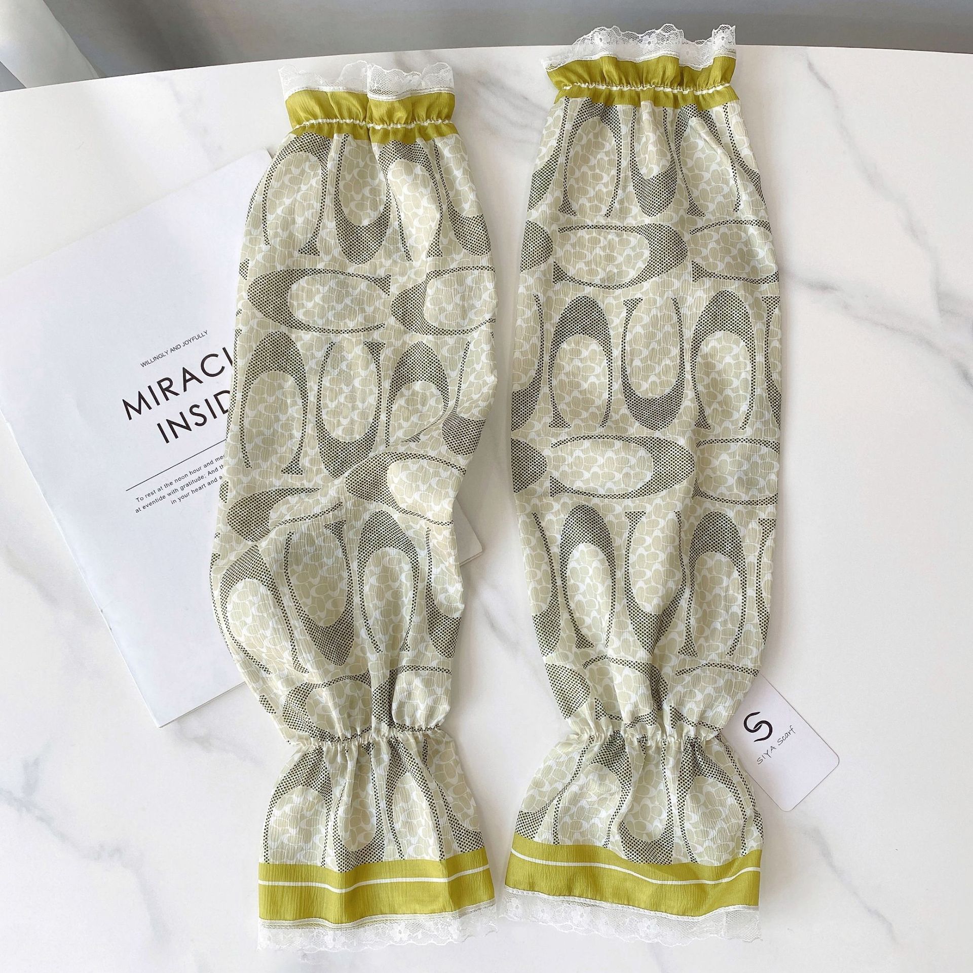 Verano estilo coreano ligero transpirable overse manga de encaje de las mujeres protección solar fresca manga de hielo satinado protección del brazo de conducción al aire libre al por mayor