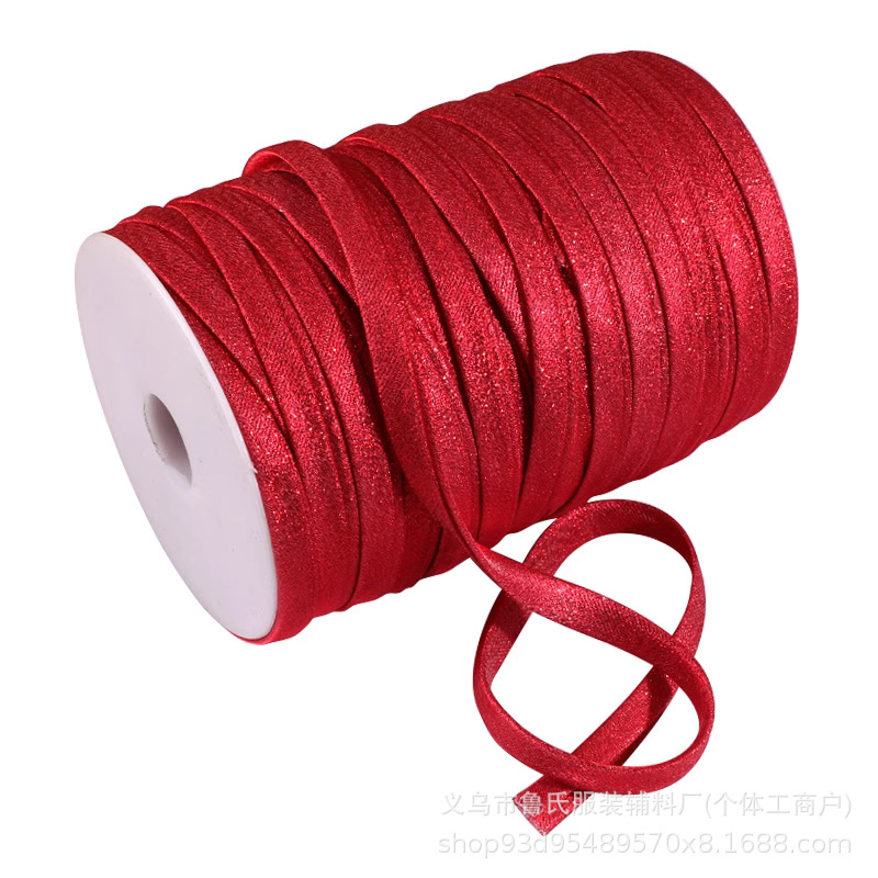 Fabricantes al por mayor cheongsam sin quemar Tang traje borde rodante borde de corte inclinado satén borde de corte de borde de prensa un rollo de cebolla dorada