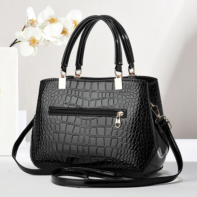 Bolso de mujer 2025 nuevo estilo de moda primavera y verano de estilo de mujer atmósfera de moda textura simple versátil bolso de hombro único