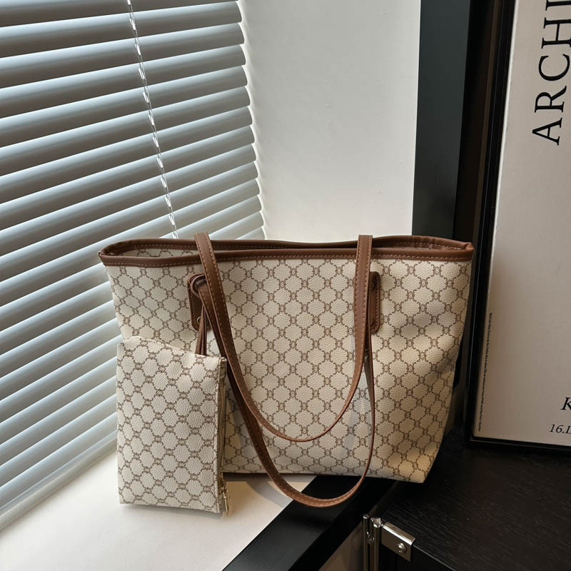 Bolso de alta calidad de gran capacidad 2025 nuevo bolso de viaje de todo fósforo de nicho para mujer bolso de niño de moda para mujer bolso portátil para mujer