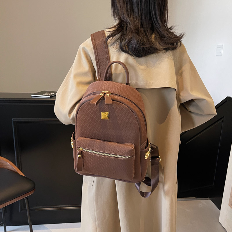 Mochila de moda coreana popular de mujer simple de color sólido mochila universitaria 2025 nueva moda de bolsas de mujer de gran capacidad
