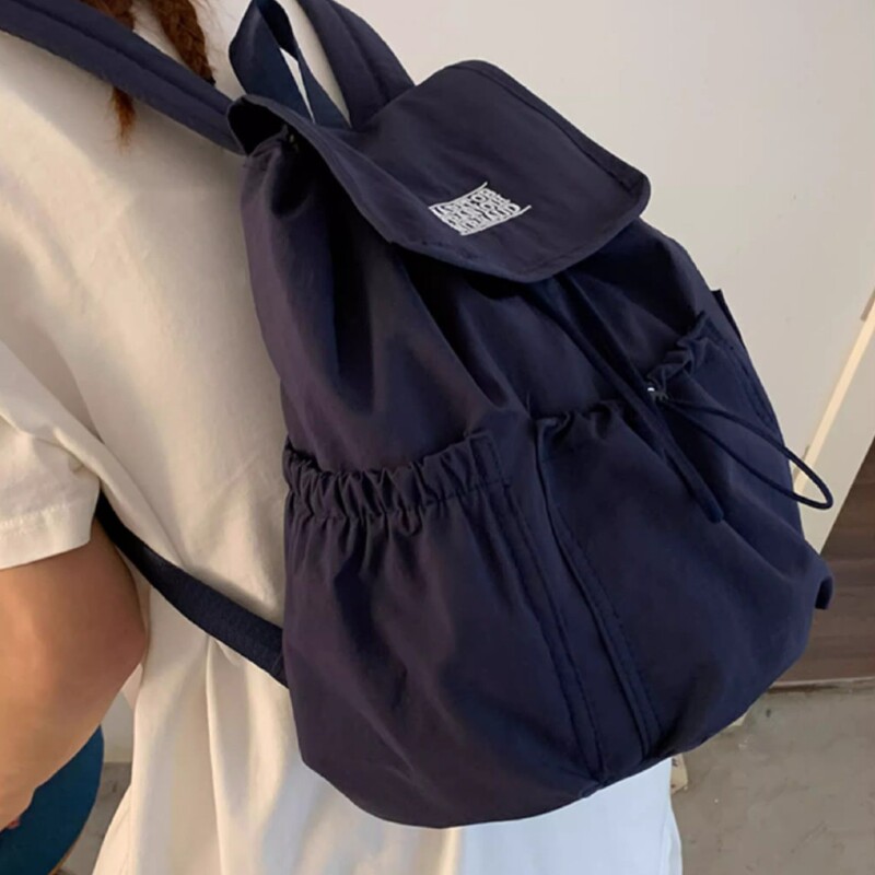 カジュアルナイロンキャンバスバックパック女性のための 2025 新しい大容量ファッションレターバックパックシンプルな女性のバックパック|undefined