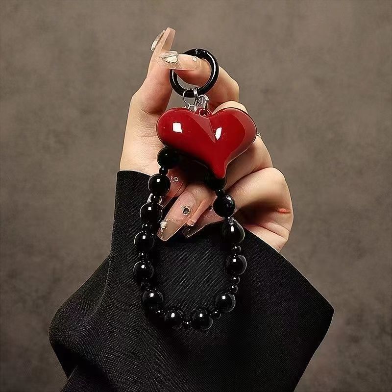 Unique and creative red heart-shaped black beaded chain, wrist strap, short lanyard, phone case, car keychain, and bag charm