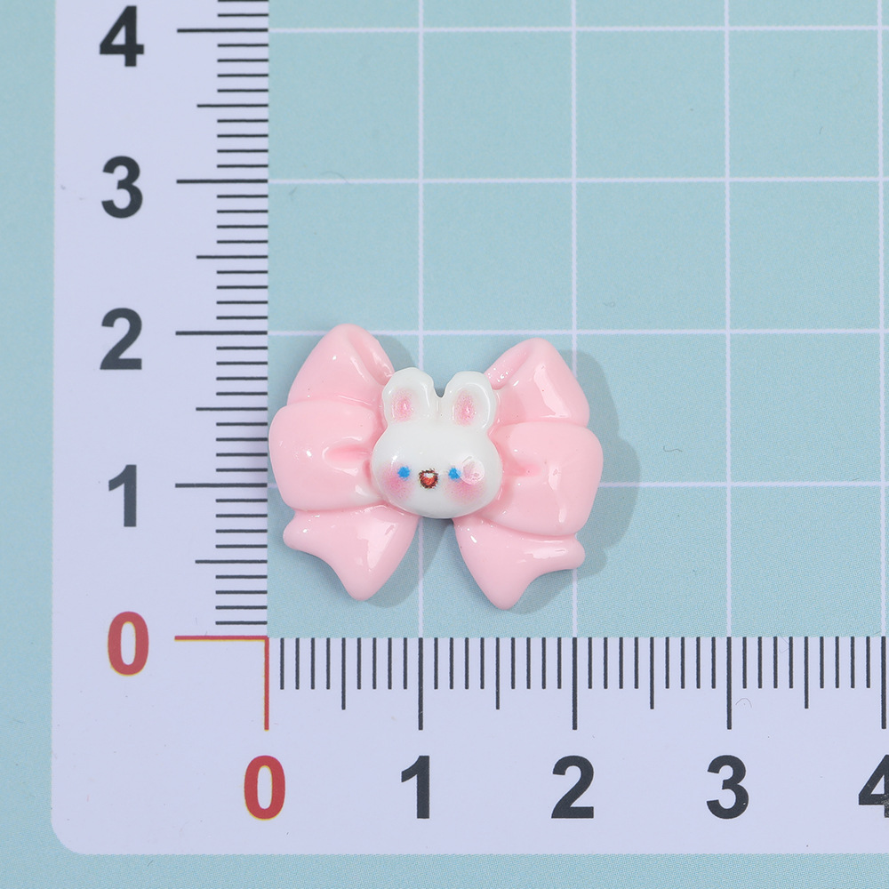 Dibujos animados macaron mariposa conejo resina accesorios DIY crema pegamento horquilla accesorios para el cabello teléfono móvil Shell material hecho a mano al por mayor