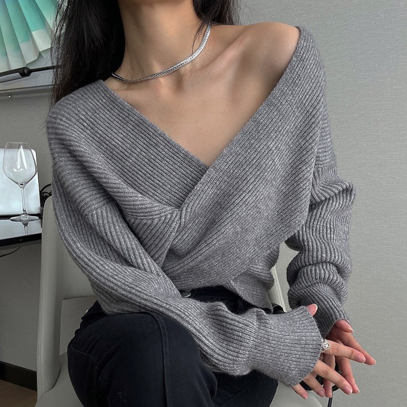 秋のvネックの底のニットの婦人服の秋冬の怠惰な風の上着のデザイン感は交差して不規則なセーターの潮があります。|undefined