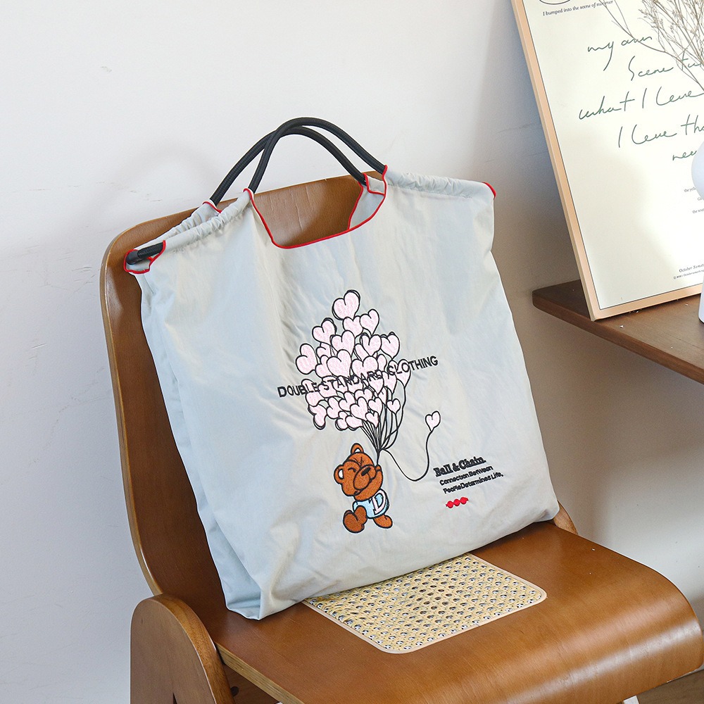 厳選ネット赤同項日系ボールチェーン刺繍レジ袋女性ファッション小衆大容量シングルバッグ潮