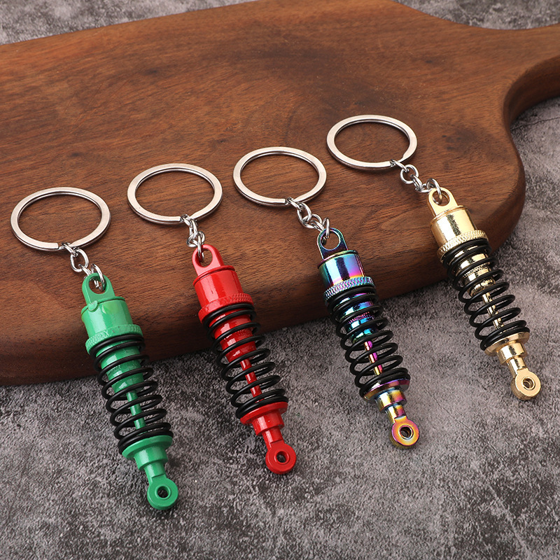 Creative metal keychain Turbine Gear wheel hub brake disc shock absorber caliper car keychain pendant wholesale Creative metal keychain Turbine Gear wheel hub brake disc shock absorber caliper car keychain pendant wholesale