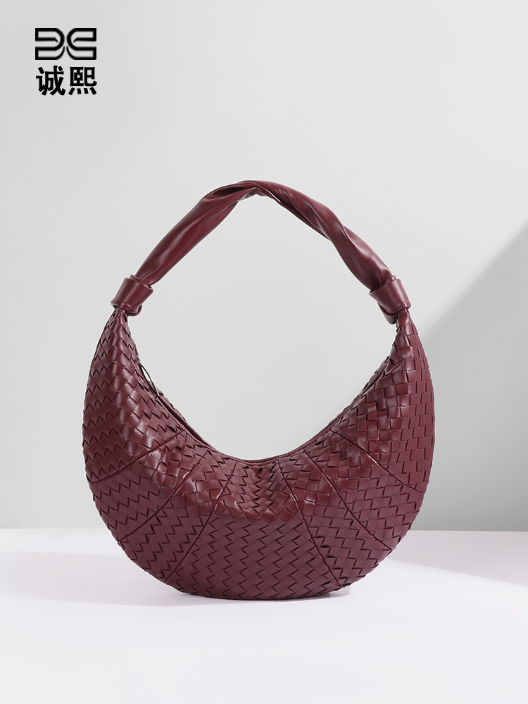 アマゾンの人気牛の角編みの三日月の包みのファッション的な手は復古のギョーザの包みを持ちます。