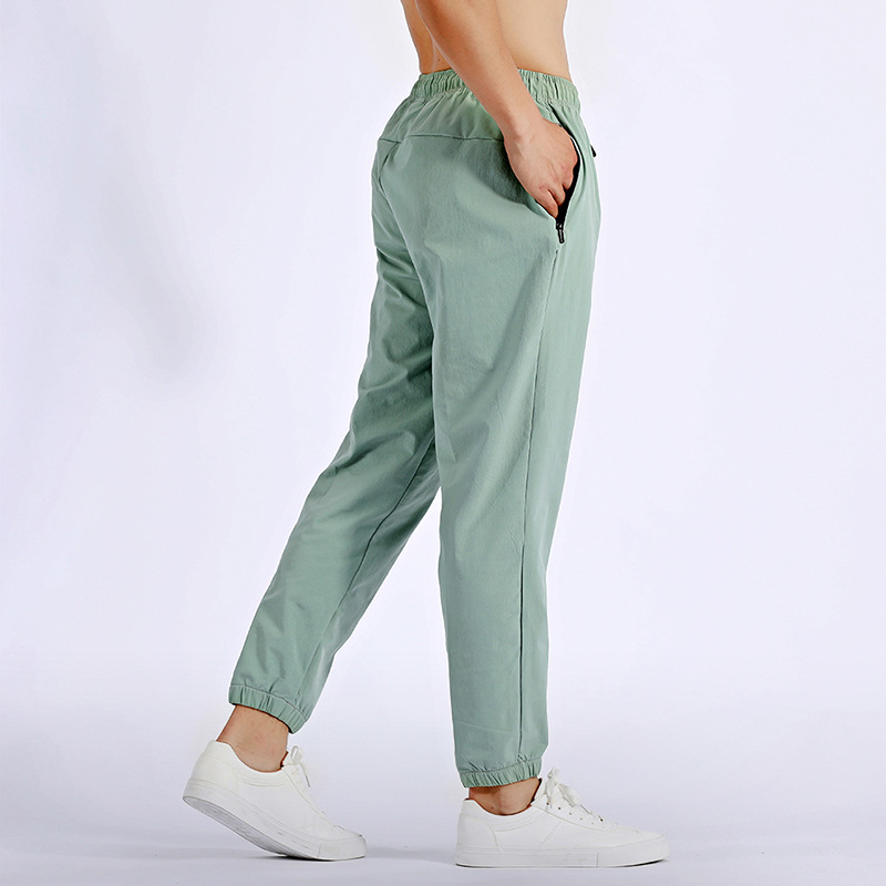 Otoño e invierno Pantalones deportivos al aire libre deportes correr pantalones de hombre ropa casual pantalones de fitness de secado rápido pantalones de chándal de baloncesto pantalones atados al tobillo