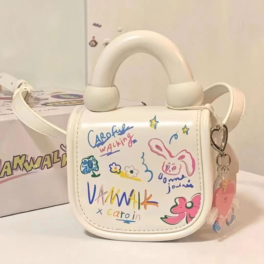 2023 primavera y verano nuevo estilo coreano estudiante bolsa de mensajero bolsa de moda Mini lindo estilo occidental de dibujos animados bolsa de graffiti para mujeres