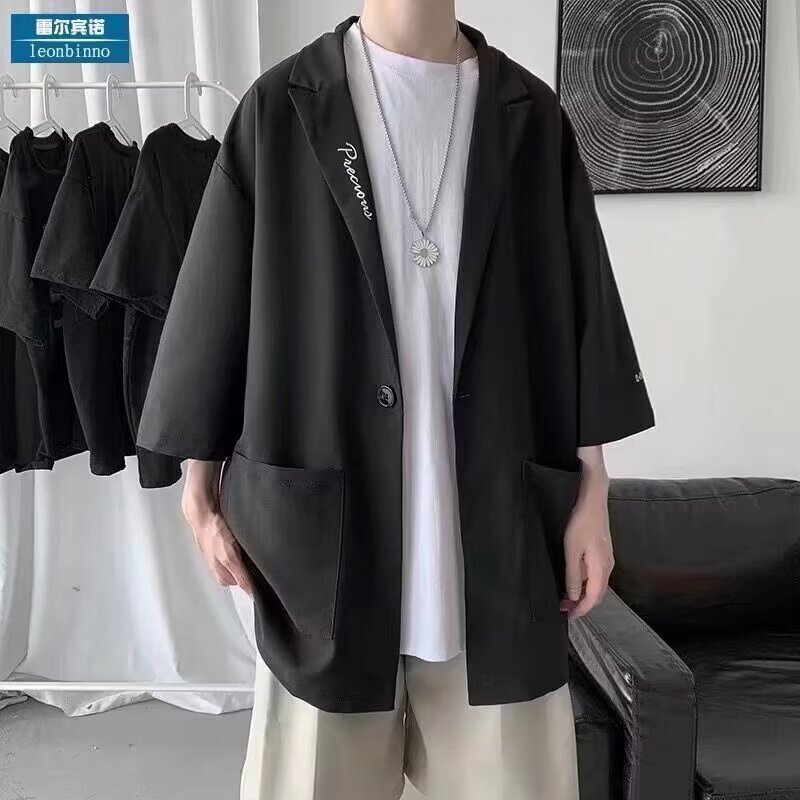 カジュアルスーツの男性の夏の薄いデザイン感の上着のデザイン感は街のデブの大きいサイズの7分の袖のコートのスーツを揚げます。