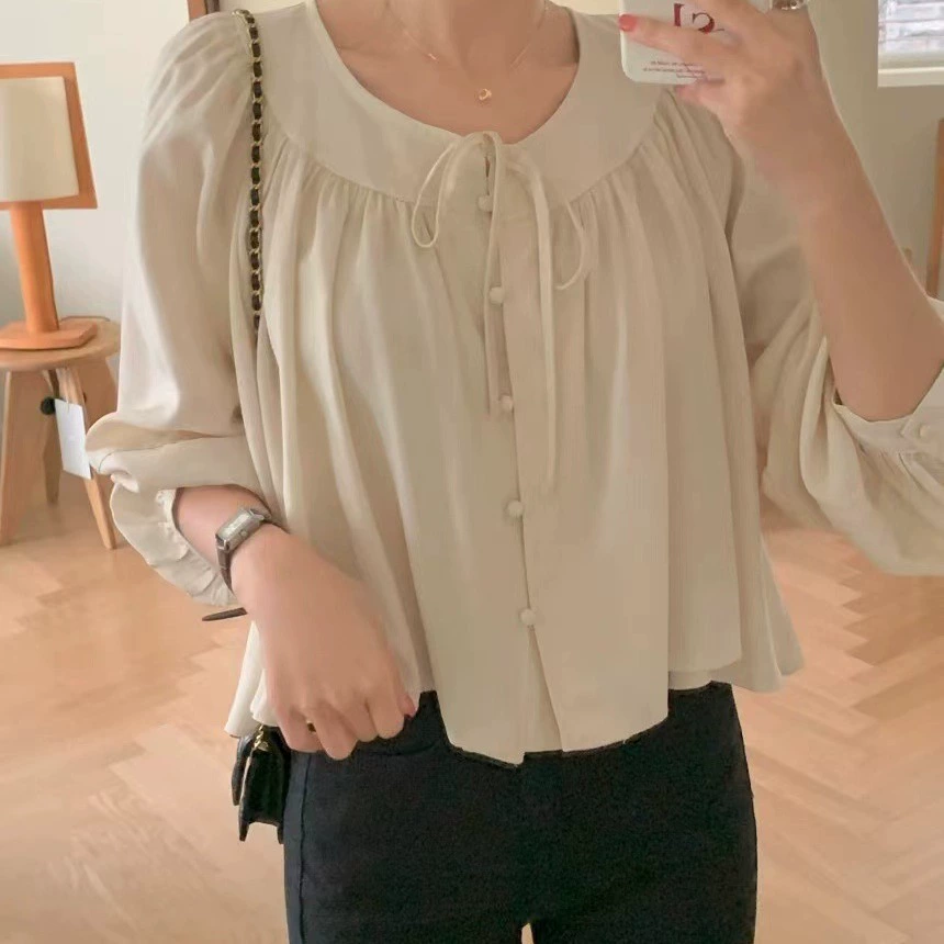 2025 Лето и осень Корейский стиль с круглым вырезом и длинным рукавом Рубашка Шикарный дизайн Повседневный красивый модный темпераментный однотонный топ для женщин