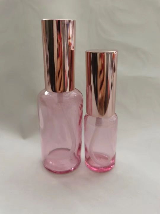 Botella de aceite esencial de color rosa transparente Esencia de líquido sub-botella gotero de vidrio Aceite de Masaje puro Rocío líquido sub-envasado de vidrio botella vacía