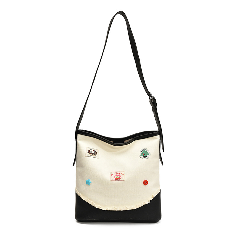 Bolso de cubo de ocio de color de contraste transfronterizo para mujer 2025 nuevo bolso de hombro de tendencia de moda salvaje bolso de mensajero de viaje de trabajo