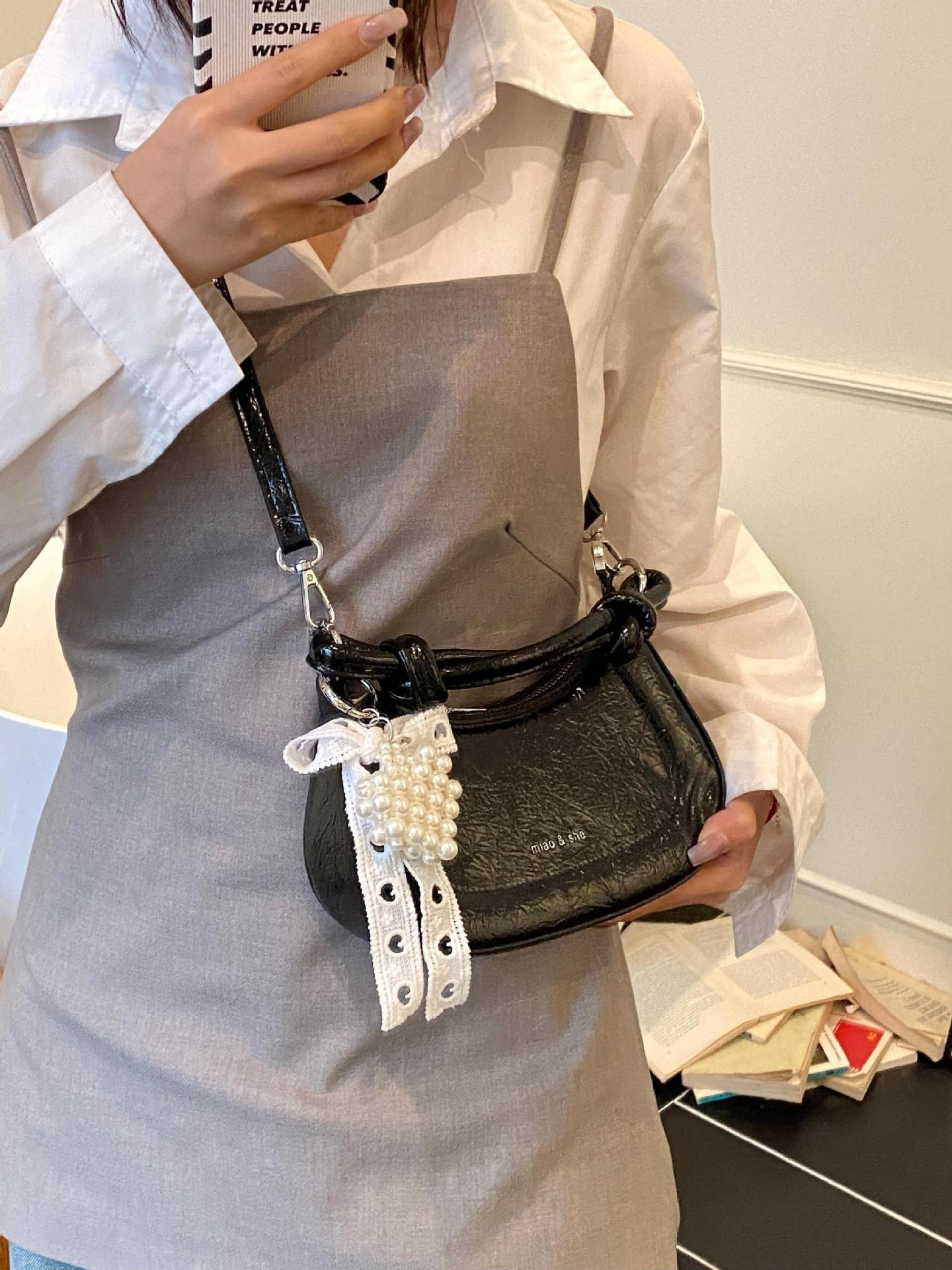 Bolso de nicho francés para mujer 2025 nuevo bolso de hombro casual de todo fósforo de moda bolso de silla de mensajero de estilo occidental