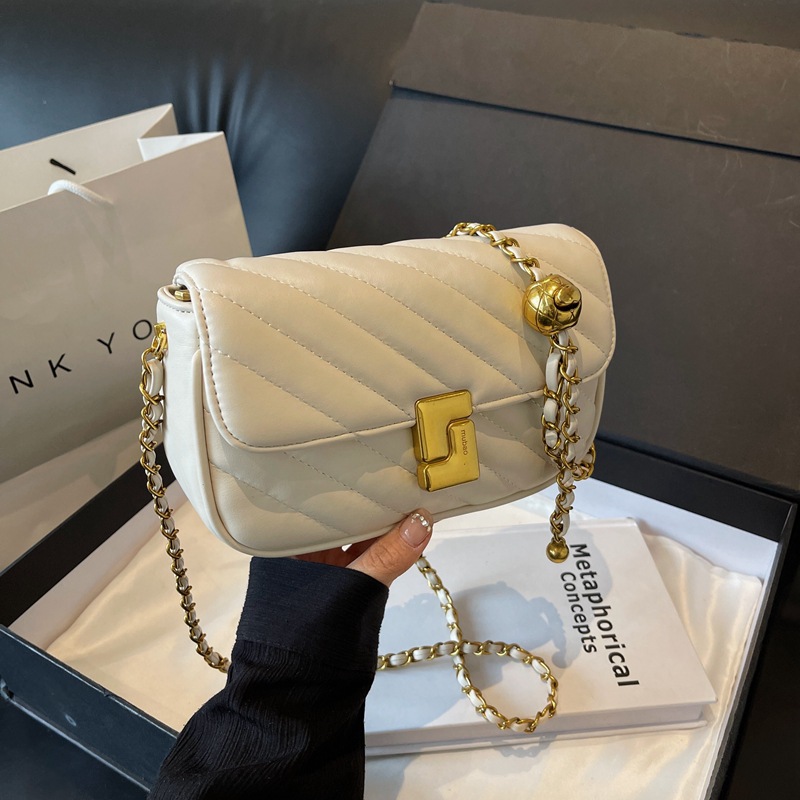 Borsa a tracolla piccola da donna, elegante e versatile, con catena di diamanti, modello 2025, di lusso, di nicchia e di alta gamma._voghion.com