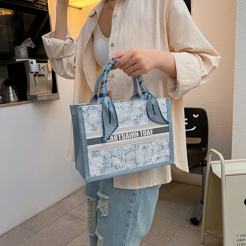 Bolso de mano de gran capacidad con estampado de letras a la moda 2026 para mujer, ideal para comercio transfronterizo en el Sudeste Asiático