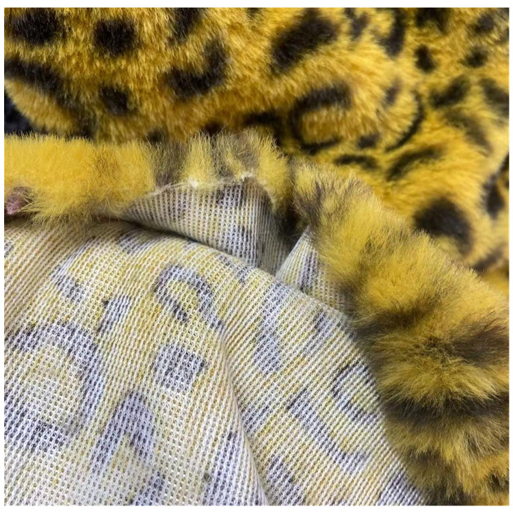 Pequeña piel de conejo impreso anillo de leopardo Imitación Piel de conejo franela ropa abrigo bolsa tela felpa alfombra de juguete tela en stock