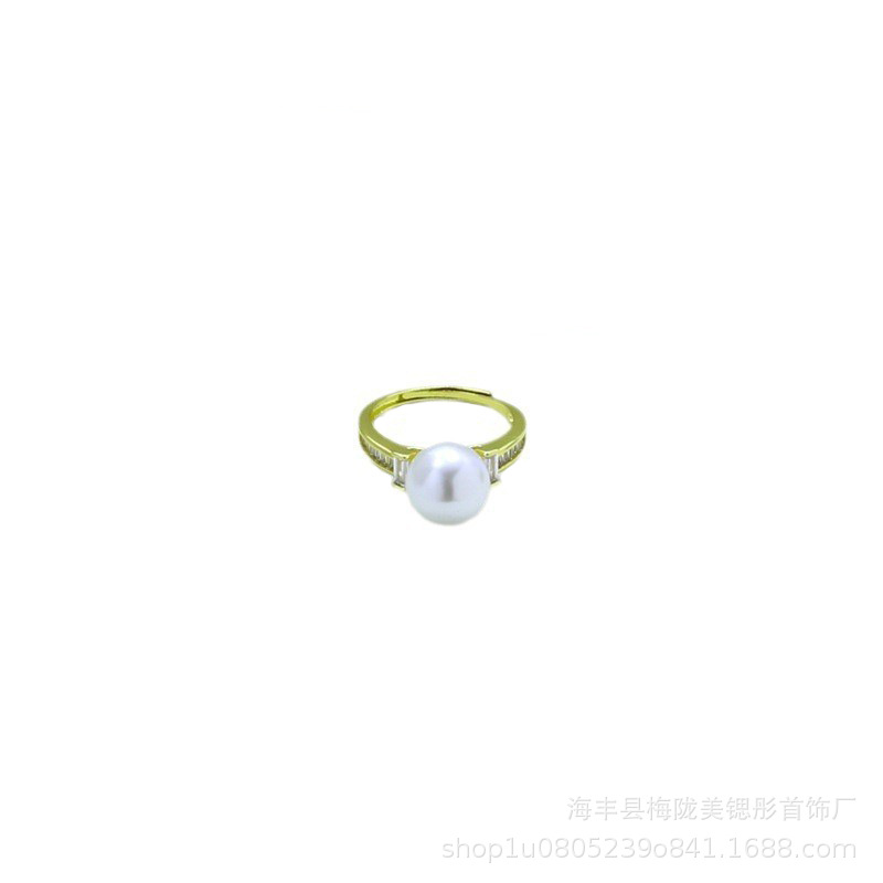 Rectangular small design ring with stone with zircon