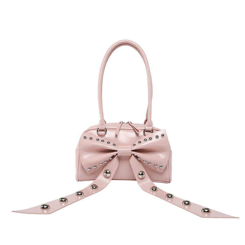 Bolso de axila de textura de alta calidad 2025 verano nuevo bolso femenino lindo lazo bolso de hombro con remache personalizado