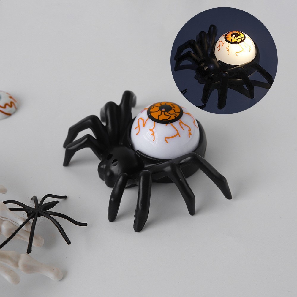 Lámpara de araña de ojo naranja