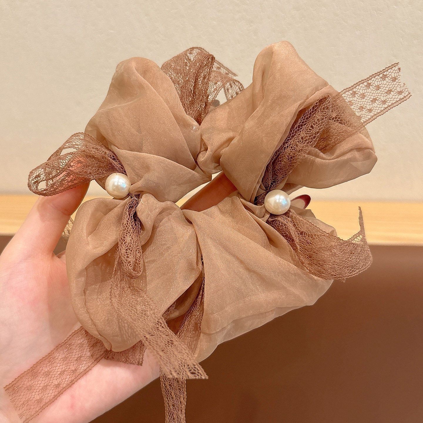 Cuerdas de cabello de viento pastoral pequeñas y altos valores faciales, anillo de cabello de intestino grande, sensación de una niña de banda de goma flácida, cuerdas de malla de banda de bola de cabeza
