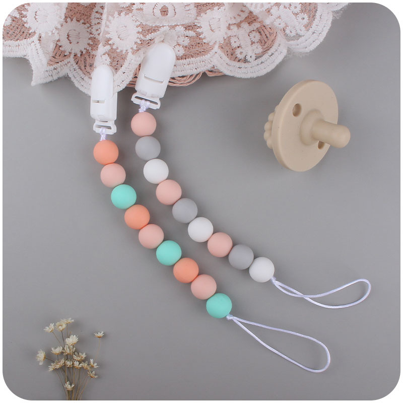 Suministros para bebés Cadena de chupete bebé creativo de silicona cuentas redondas clip de pezón anti-caída con dos juegos