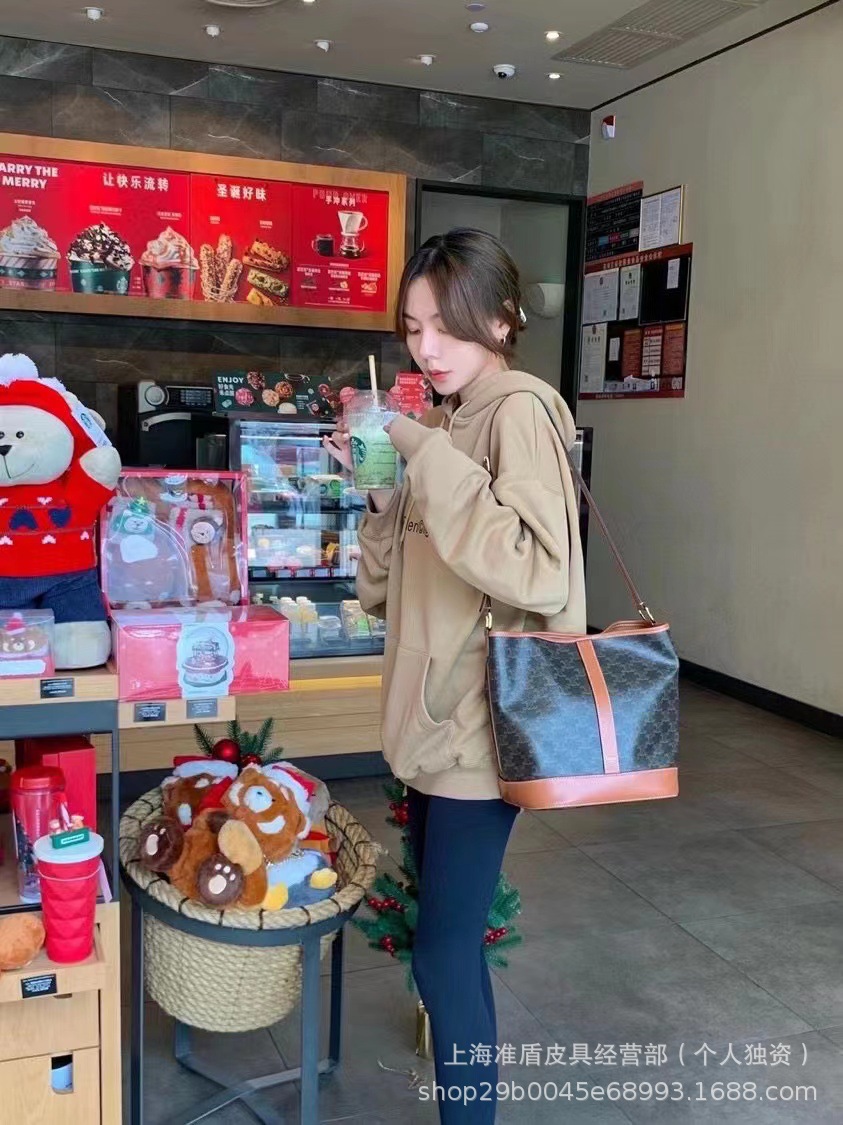 2023 nuevo bolso de mujer arco del triunfo bolso de cubo de agua de alta gama retro bolsa de compras de flores antiguas bolsa de hombro único de gran capacidad