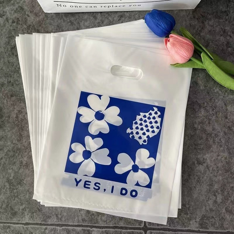 手提塑料袋子服裝店ins風飾品店包裝袋 女裝衣服店擺攤四指袋子