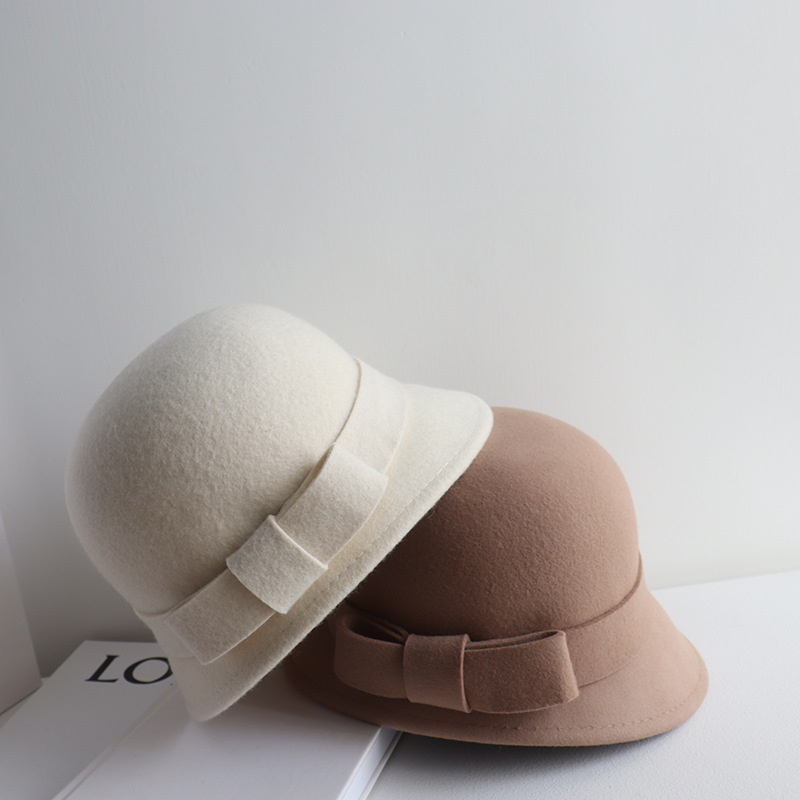 Estilo francés poco Hepburn frente Largo trasero corto arco sombrero de lana pescador cuenca sombrero blanco crema pequeño ala sombrero femenino
