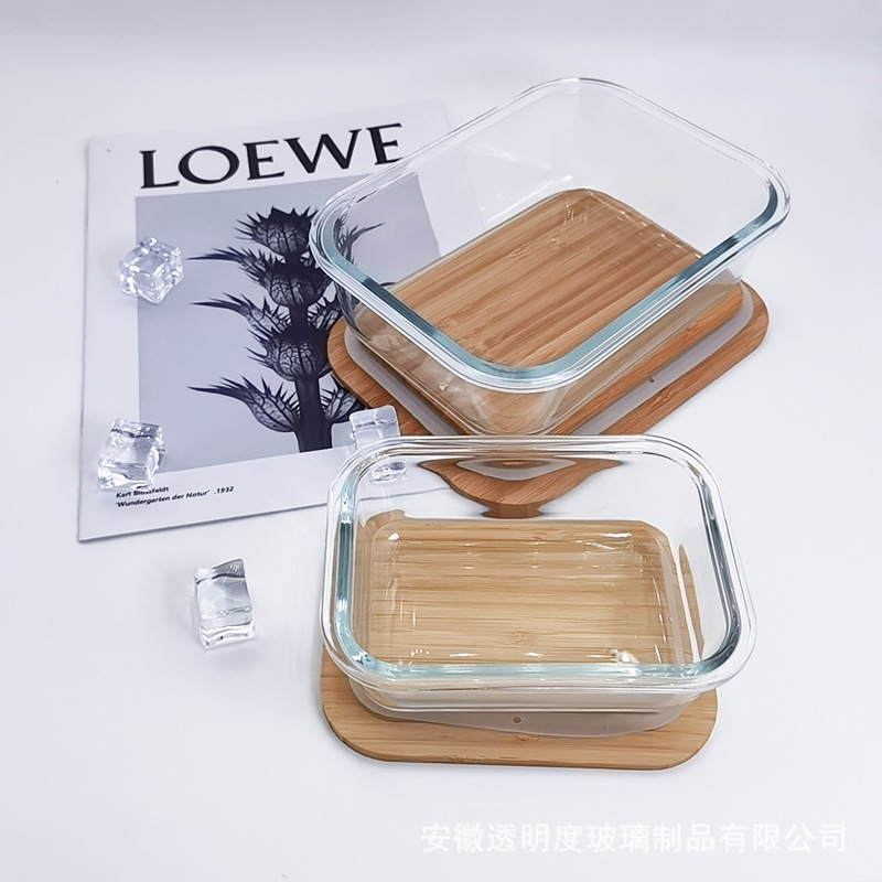 La lonchera de vidrio con cubierta de bambú y madera ecológica se puede calentar en el horno microondas, la caja de conservación congelada, el tazón de bento, la caja de comedor sellada con la tapa