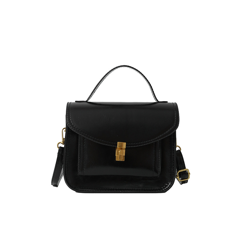 Bagos portátiles de estilo extranjero 2025, primavera nueva moda de nicho, bolsos de hombro de moda, bolsos de bloqueo personalizados, bolsos de mujer de tramo inclinado