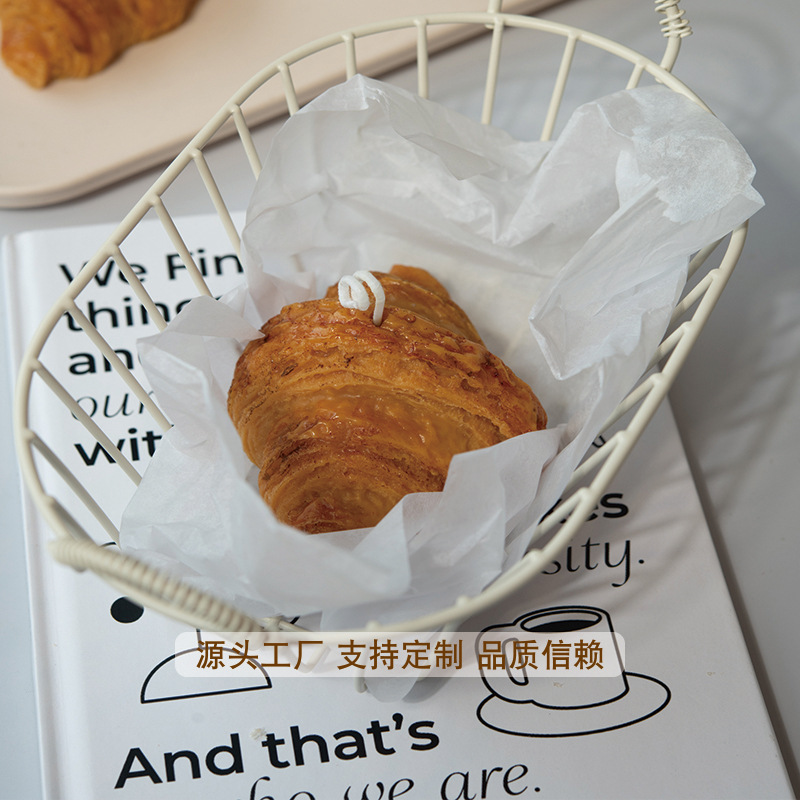 Ventas transfronterizas en caliente croissants con forma de panela de banano, decoración de simulación avanzada, postres, regalos de mano al por mayor.