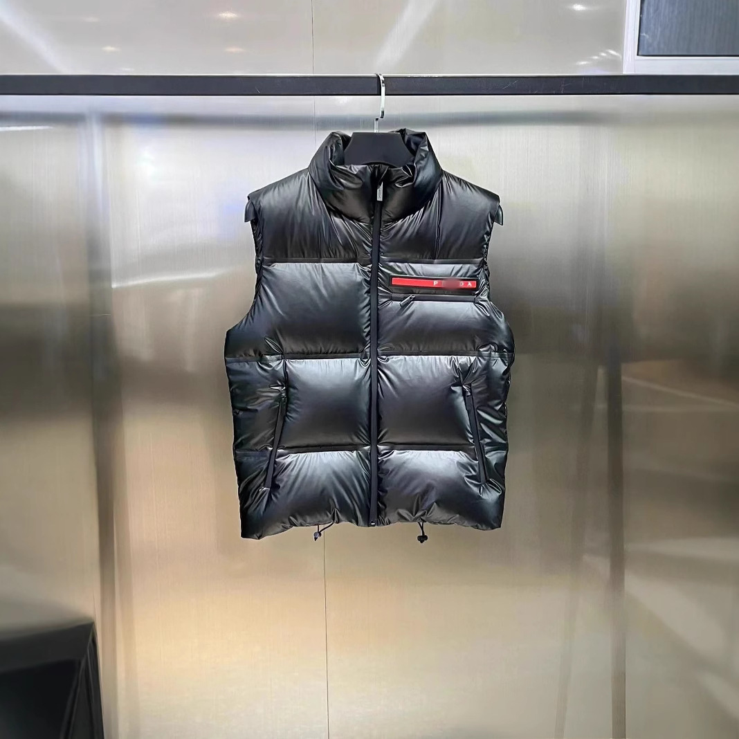 Marca de moda de invierno europea pan abrigada y esponjosa chaqueta de plumón Pujia con cremallera chaqueta casual de moda para hombres y mujeres en stock