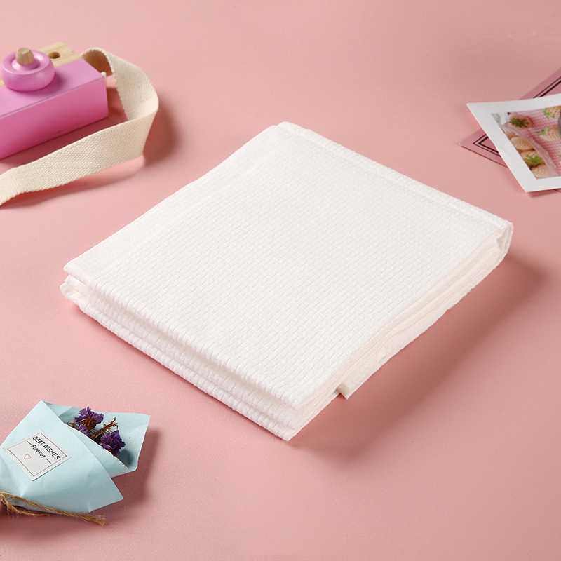 100%粘胶人造丝无纺布压花图案白色圆点图案水刺无纺布用于一次性