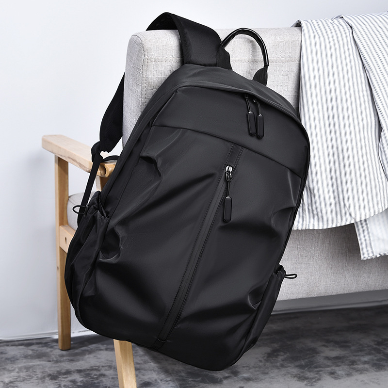 Simple business-style men's backpack with USB charging port 15.6inch for laptop, office, business trips, and casual use
