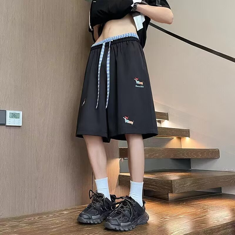 Pantalones casuales bordados de verano tendencia masculina sueltos más grandes pantalones de estilo de salchicha para hombres